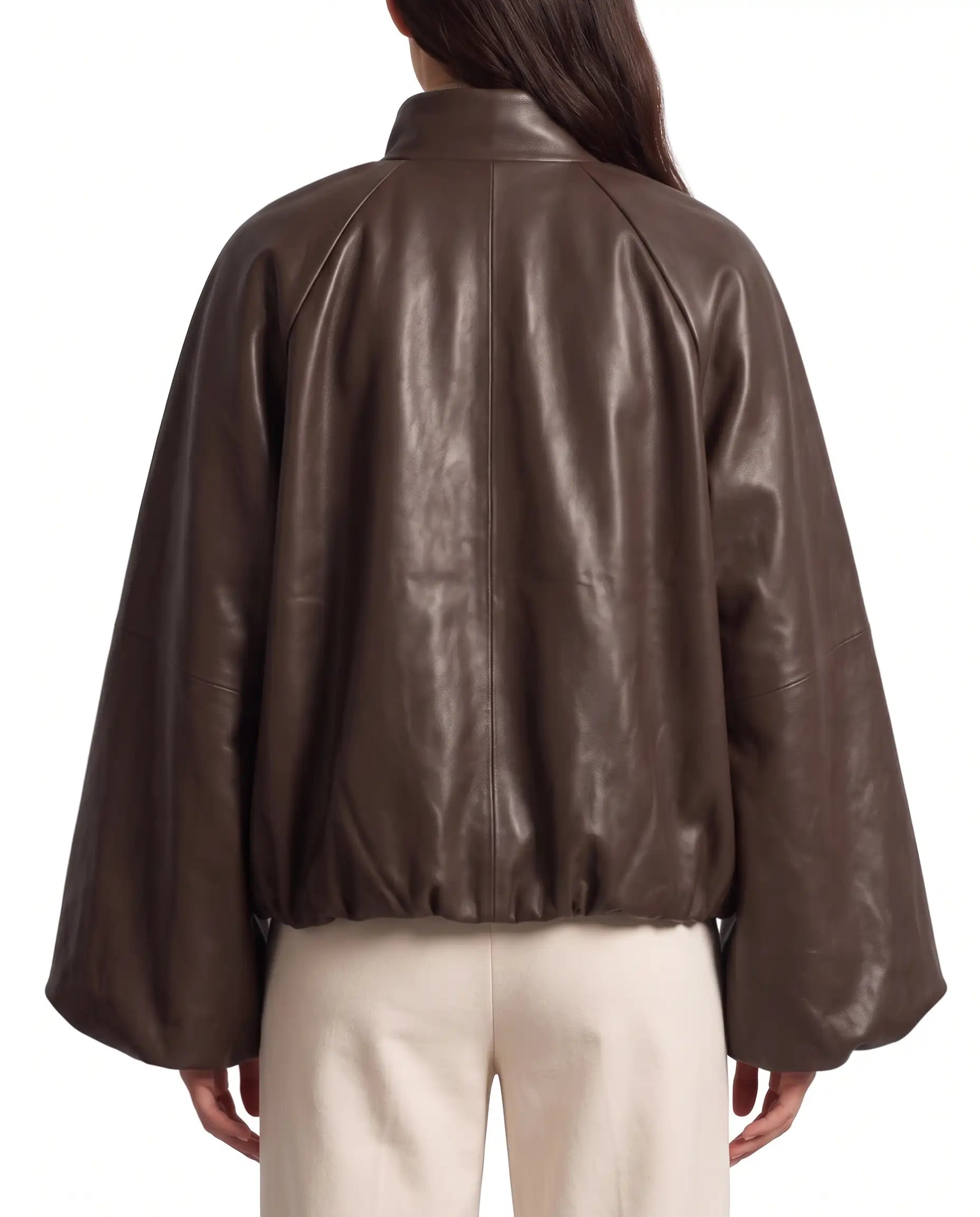 Back view of The Eira women's brown genuine lambskin oversized balloon-sleeve leather jacket by Amrika Leather highlighting its relaxed oversized silhouette.