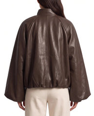 Back view of The Eira women's brown genuine lambskin oversized balloon-sleeve leather jacket by Amrika Leather highlighting its relaxed oversized silhouette.