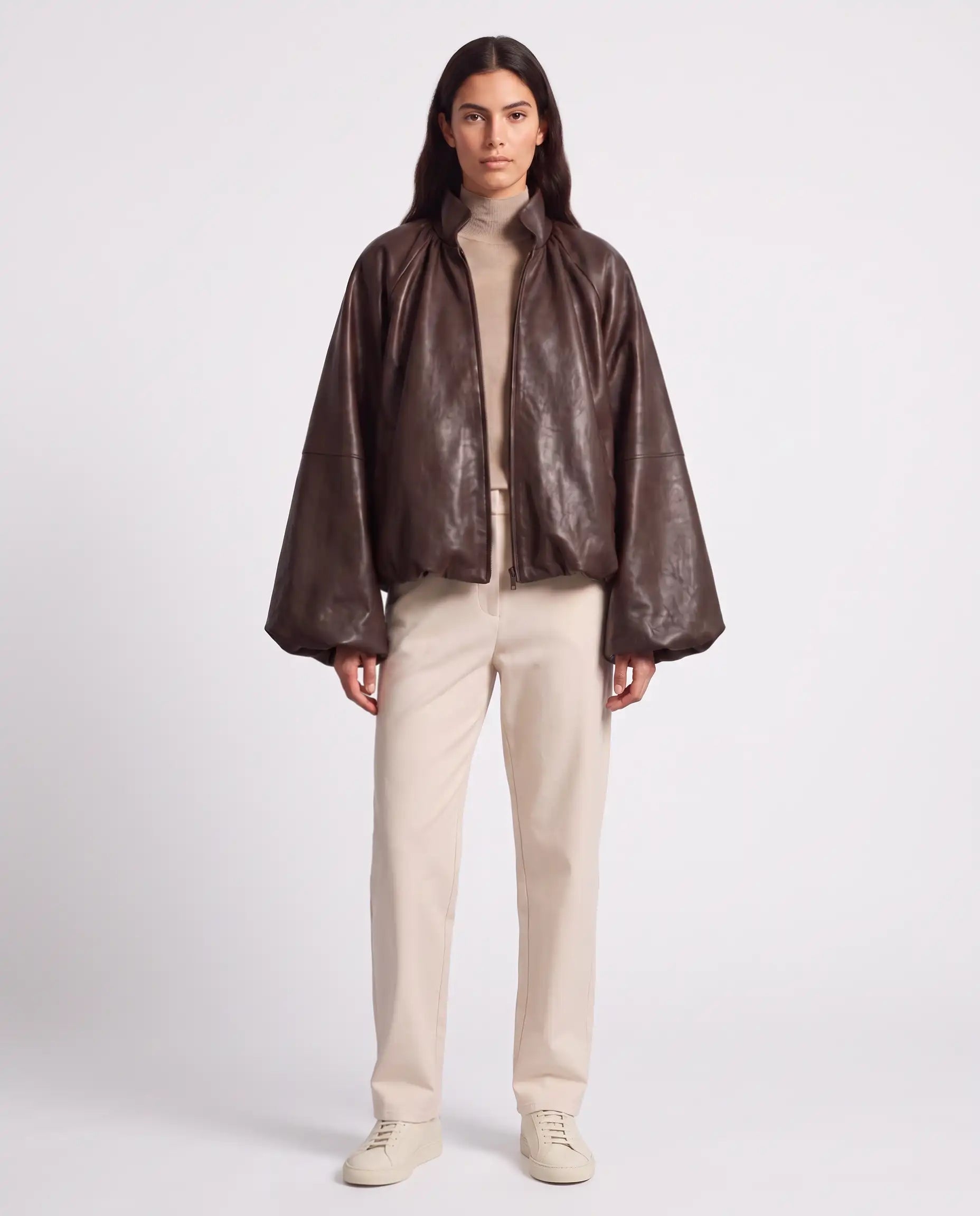 Full-length view of The Eira women's brown genuine lambskin oversized balloon-sleeve leather jacket by Amrika Leather showcasing its complete oversized silhouette and styling.
