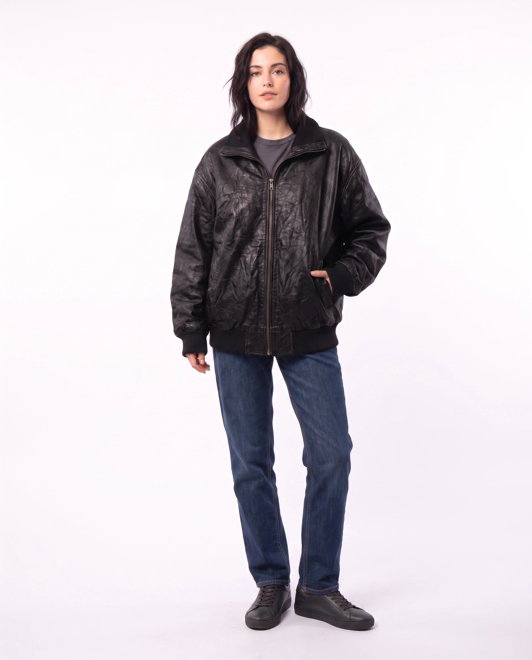 Full-length view of The Juno women's washed lambskin leather bomber jacket showcasing its complete relaxed silhouette and ribbed detailing.