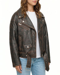 Side view of The Rowan women's distressed brown genuine lambskin oversized biker leather jacket by Amrika Leather showcasing the relaxed profile and biker detailing.