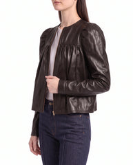 Side view of The Maeve women's gathered lambskin leather jacket highlighting puff shoulders and elegant drape