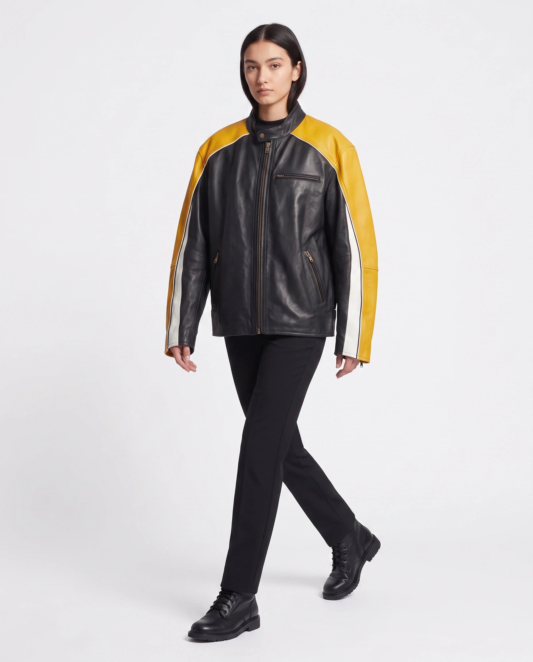 Full-length view of The Monaco oversized racing leather jacket styled with a contemporary outfit.