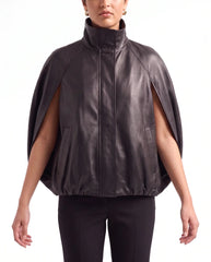 Model wearing The Selene black lambskin leather cape jacket with modern oversized fit