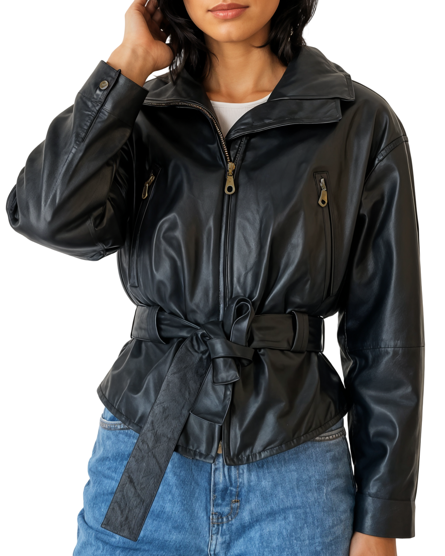 Person wearing a black leather jacket with a belt, standing against a plain background
