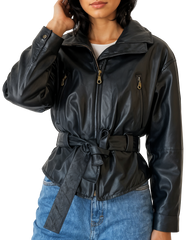 Person wearing a black leather jacket with a belt, standing against a plain background