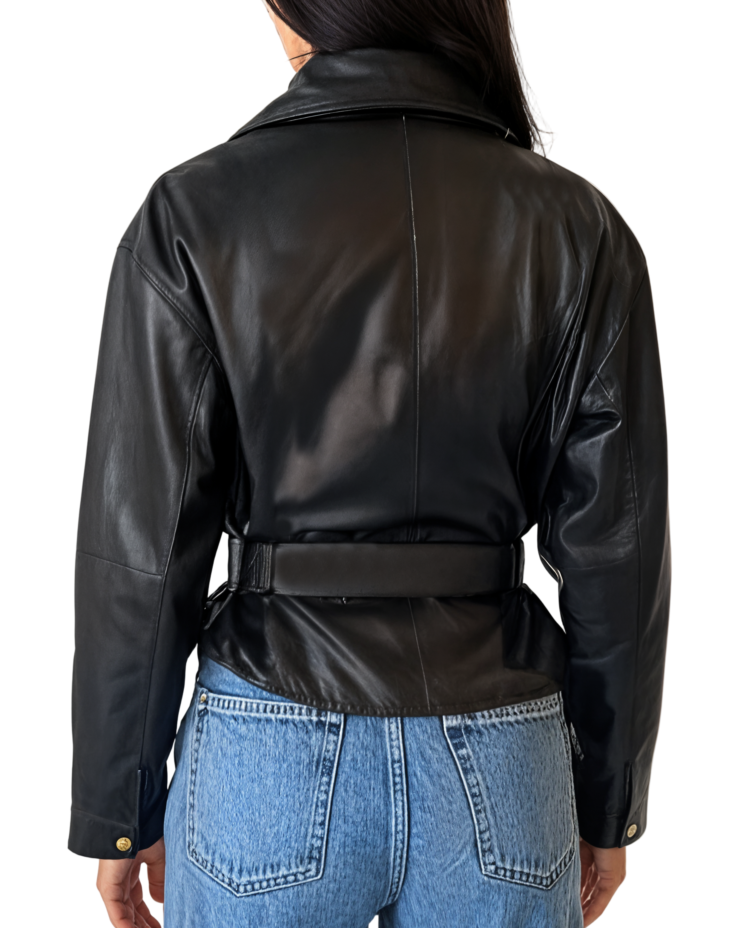 Person wearing a black leather jacket and blue jeans on a plain background