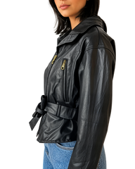 Velora Black leather jacket worn by a person on a plain background