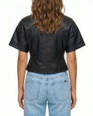 Back view of The Ayla women's black genuine lambskin short sleeve leather jacket by Amrika Leather highlighting the tailored fit and clean back design.