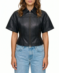 Front view of The Ayla women's black real lambskin short sleeve leather jacket by Amrika Leather featuring a tailored silhouette, shirt collar, and YKK front zipper.