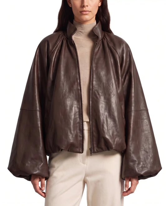 Front view of The Eira women's brown real lambskin oversized balloon-sleeve leather jacket by Amrika Leather featuring a high collar and voluminous sleeves.