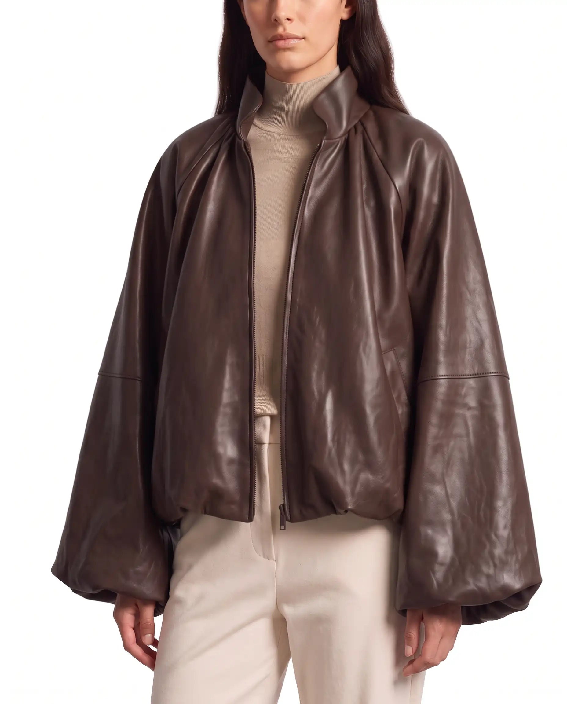 Side view of The Eira women's brown genuine lambskin oversized balloon-sleeve leather jacket by Amrika Leather showcasing its relaxed silhouette and voluminous sleeves.