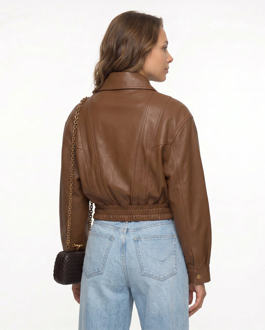 Back view of The Elowen women's brown genuine lambskin cropped leather jacket by Amrika Leather highlighting its clean minimalist design.