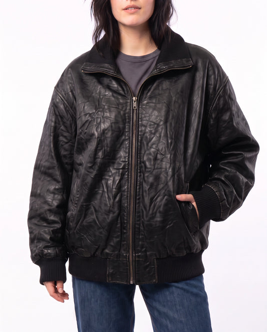 Front view of The Juno women's washed lambskin leather bomber jacket by Amrika Leather featuring a ribbed collar, cuffs, and waistband.