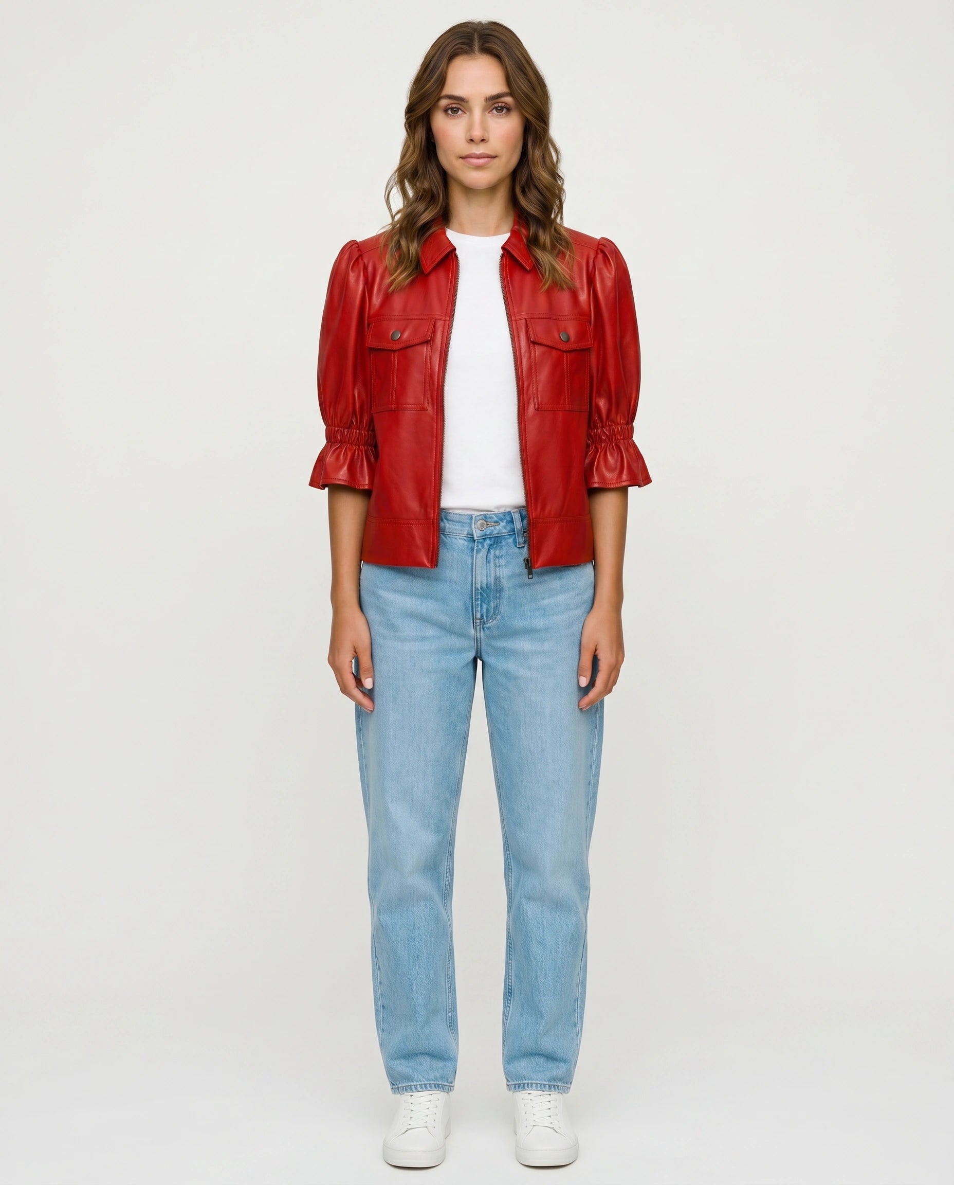 Model wearing The Lumi women's red real lambskin leather puff sleeve jacket by Amrika Leather.