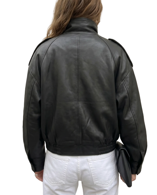 Back view of The Noa women's black genuine lambskin oversized funnel neck leather jacket by Amrika Leather highlighting the clean oversized silhouette.