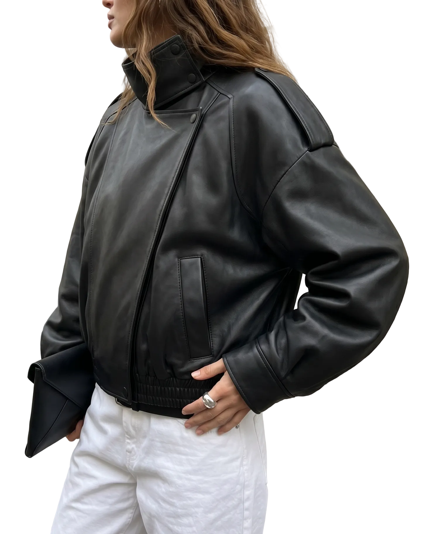 Side view of The Noa women's black genuine lambskin oversized funnel neck leather jacket by Amrika Leather showcasing the relaxed silhouette and modern profile.