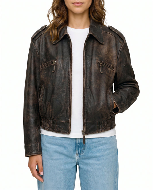 Front view of The Ronan women's distressed brown real lambskin aviator bomber leather jacket by Amrika Leather featuring a structured collar, zippered chest pockets, and YKK front zipper.
