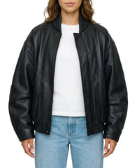 Front angled view of The Sora women's black genuine lambskin oversized bomber leather jacket by Amrika Leather showcasing the relaxed silhouette and minimalist design.