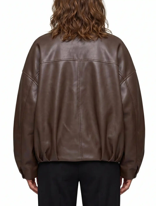 Back view of The Veya women's brown genuine lambskin oversized belted leather jacket by Amrika Leather highlighting the clean oversized silhouette.