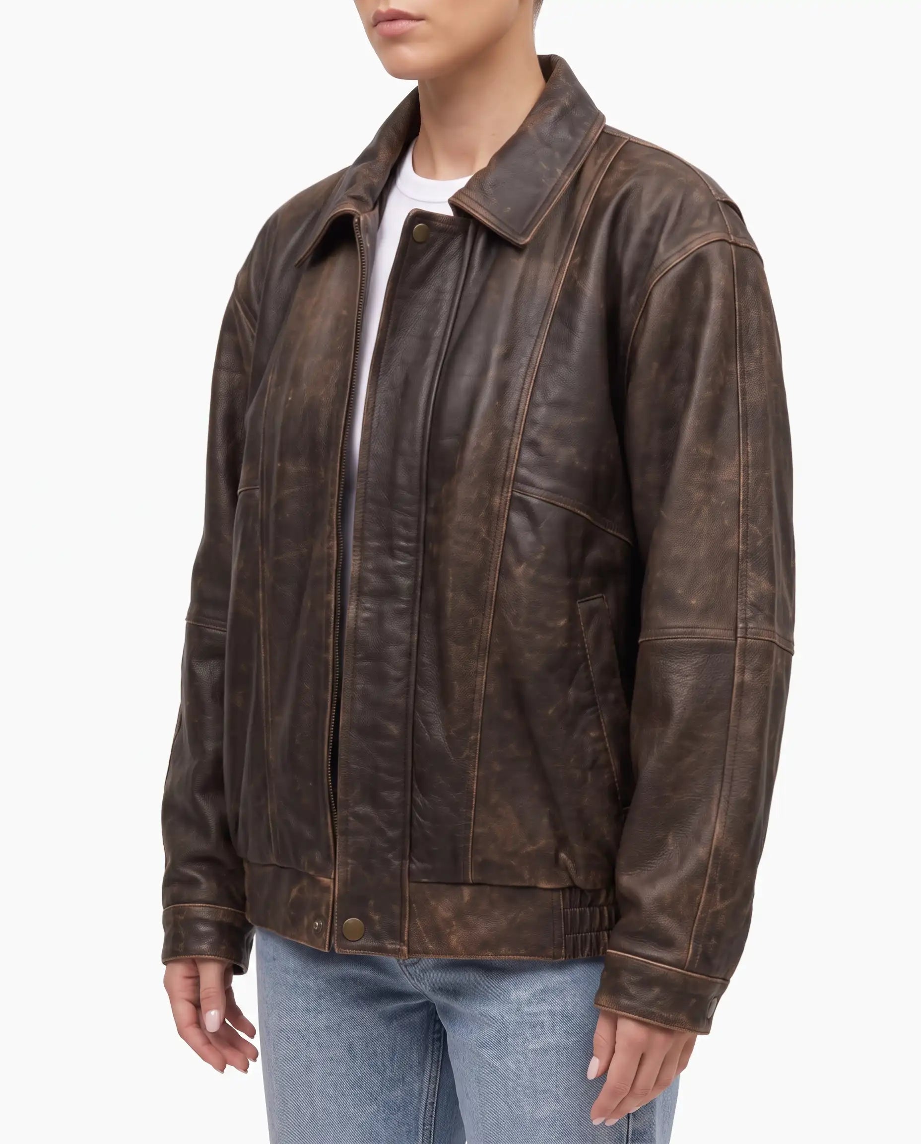 Side view of The Aspen women's oversized distressed brown lambskin leather jacket with relaxed fit.