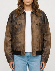 Model wearing The Hazel women's waxed suede leather bomber jacket with a vintage-inspired distressed finish.