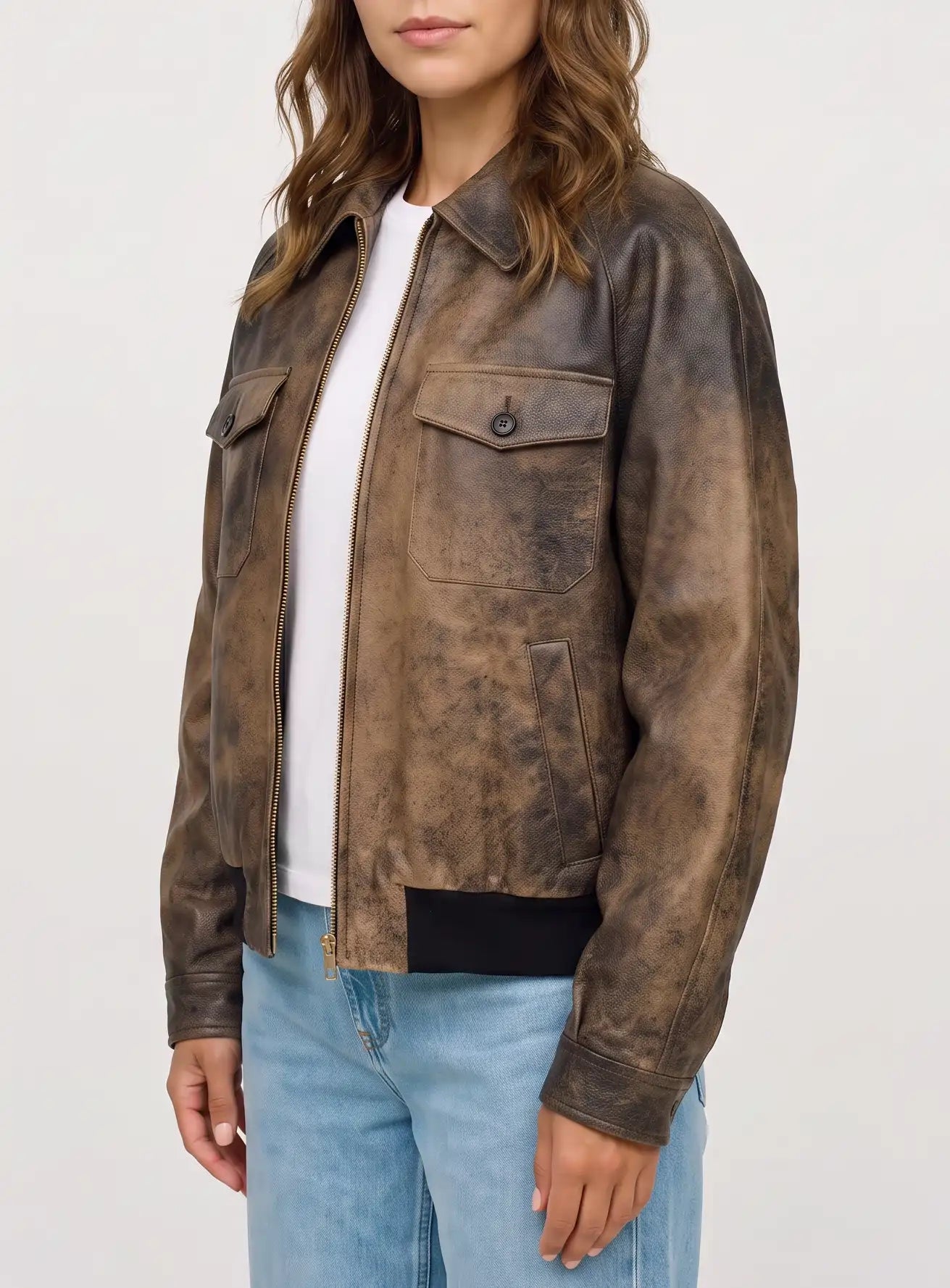 Side view of The Hazel women's distressed waxed suede leather bomber jacket with utility-inspired styling.