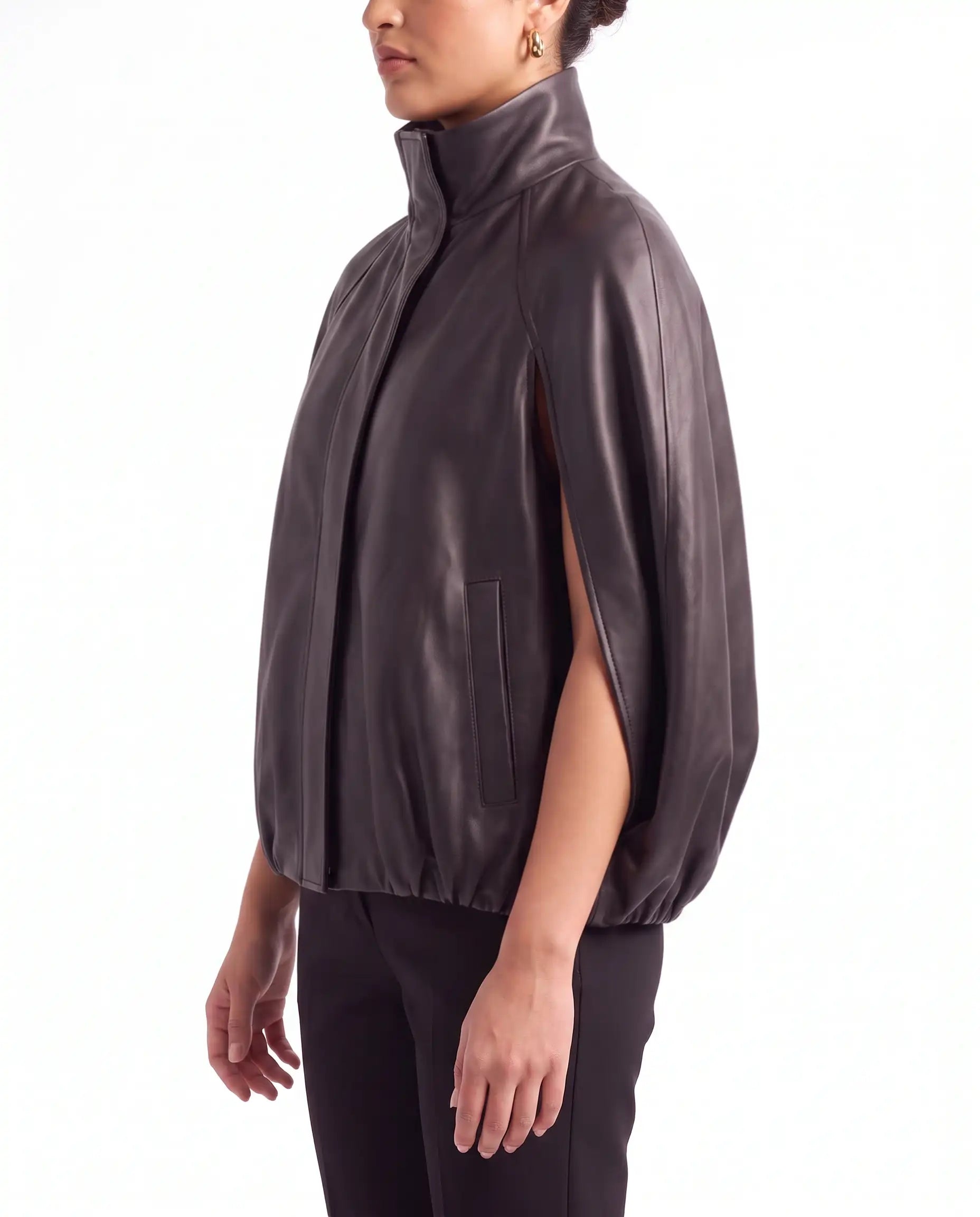 Side view of The Selene black lambskin leather cape jacket showing elegant cape silhouette